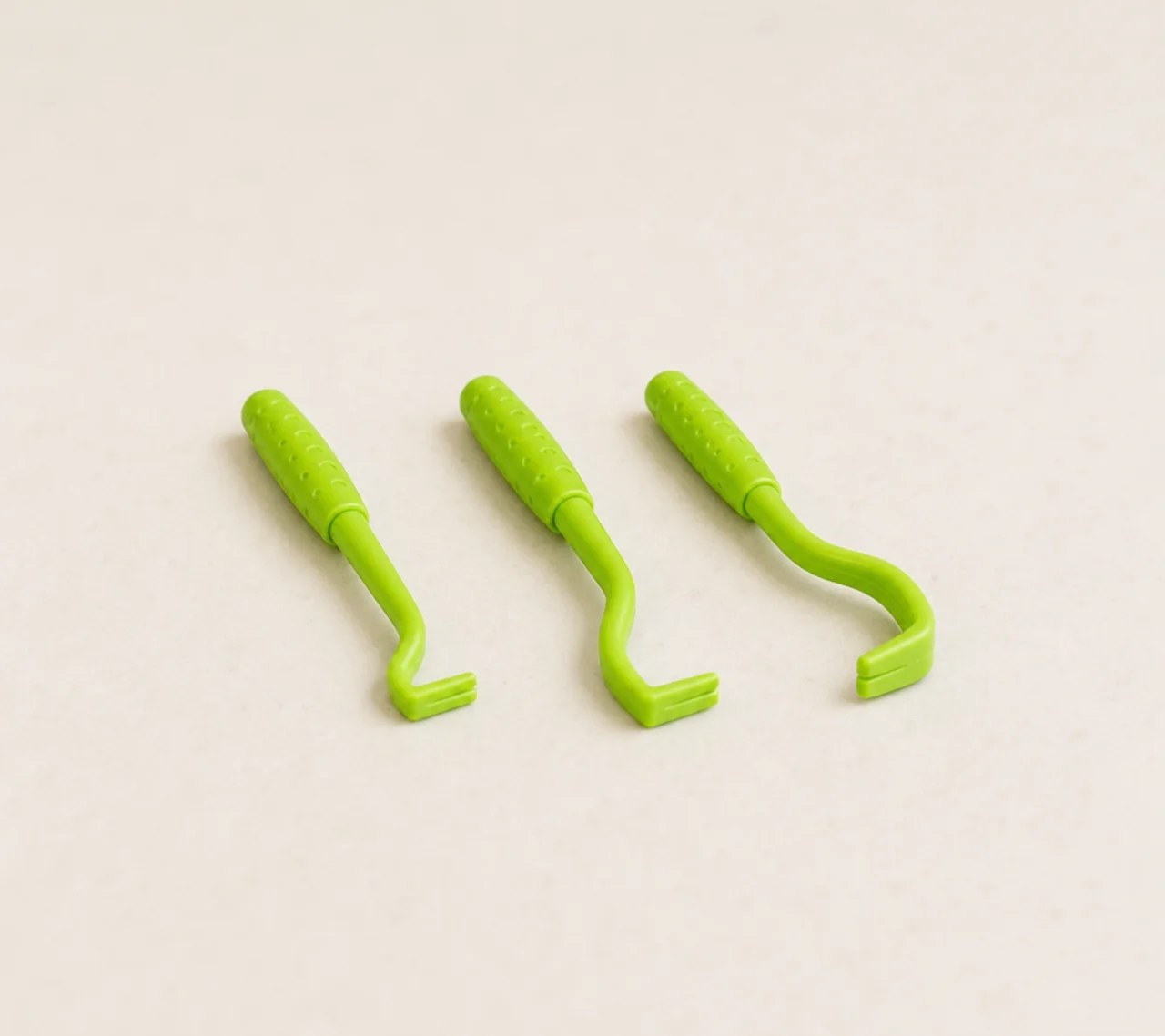 Three tick remover tools in different sizes